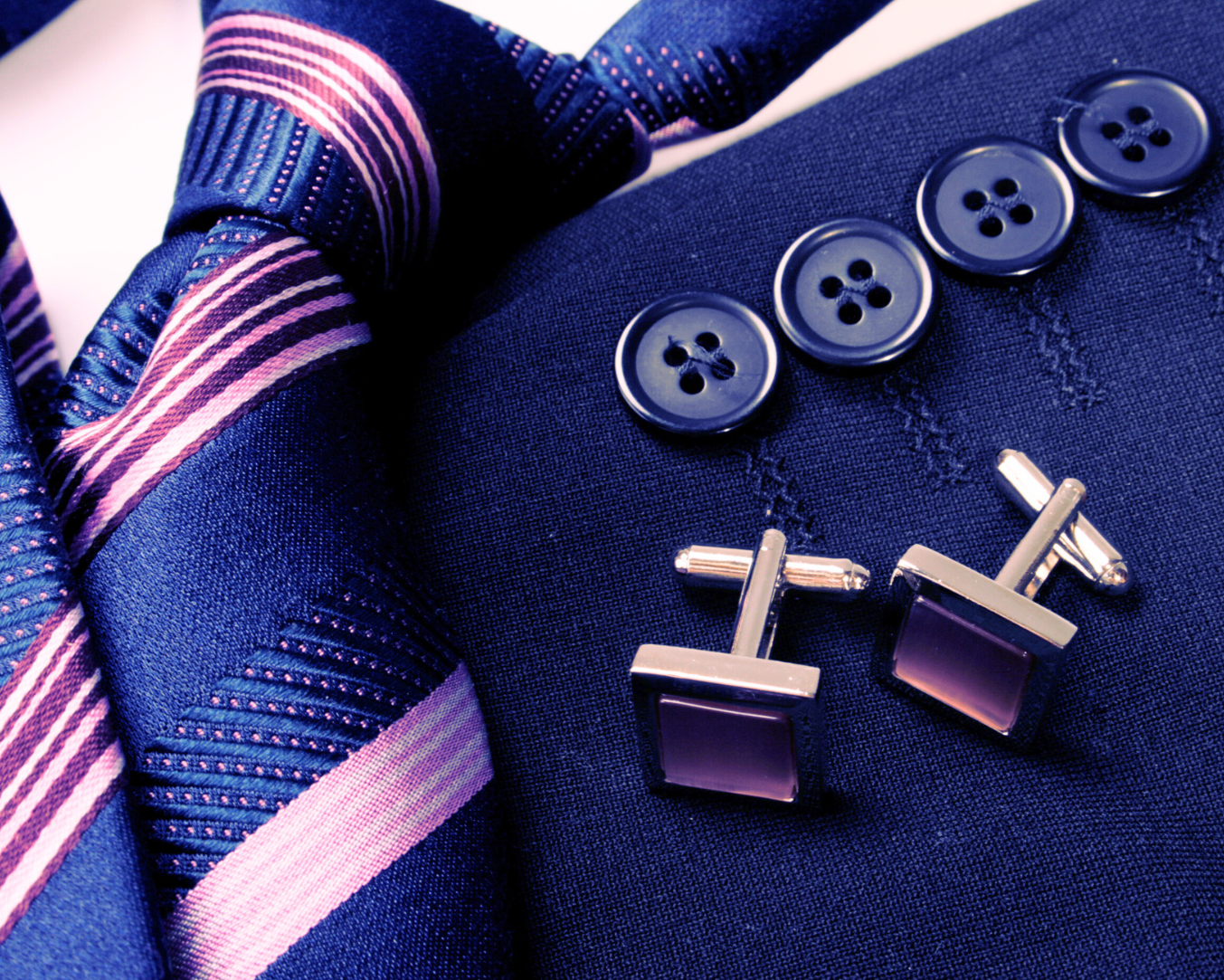 Suit with tie and cuff links